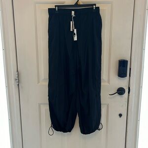 Black Anthropologie parachute pants by daily practice new with tags never worn